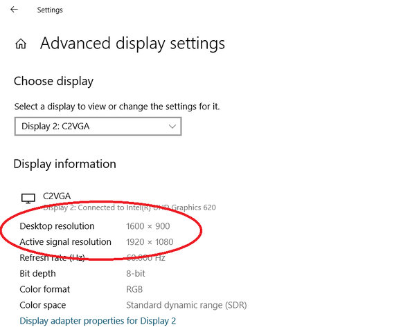Screenshot of Windows 10 "Advanced display settings" page, showing "Active signal resolution" larger than "Desktop resolution".