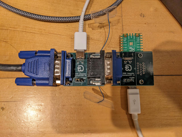 Photo of a Pi Pico (right) hot-glued to a VGA PCB, plugged into a VGA EDID emulator PCB (left)